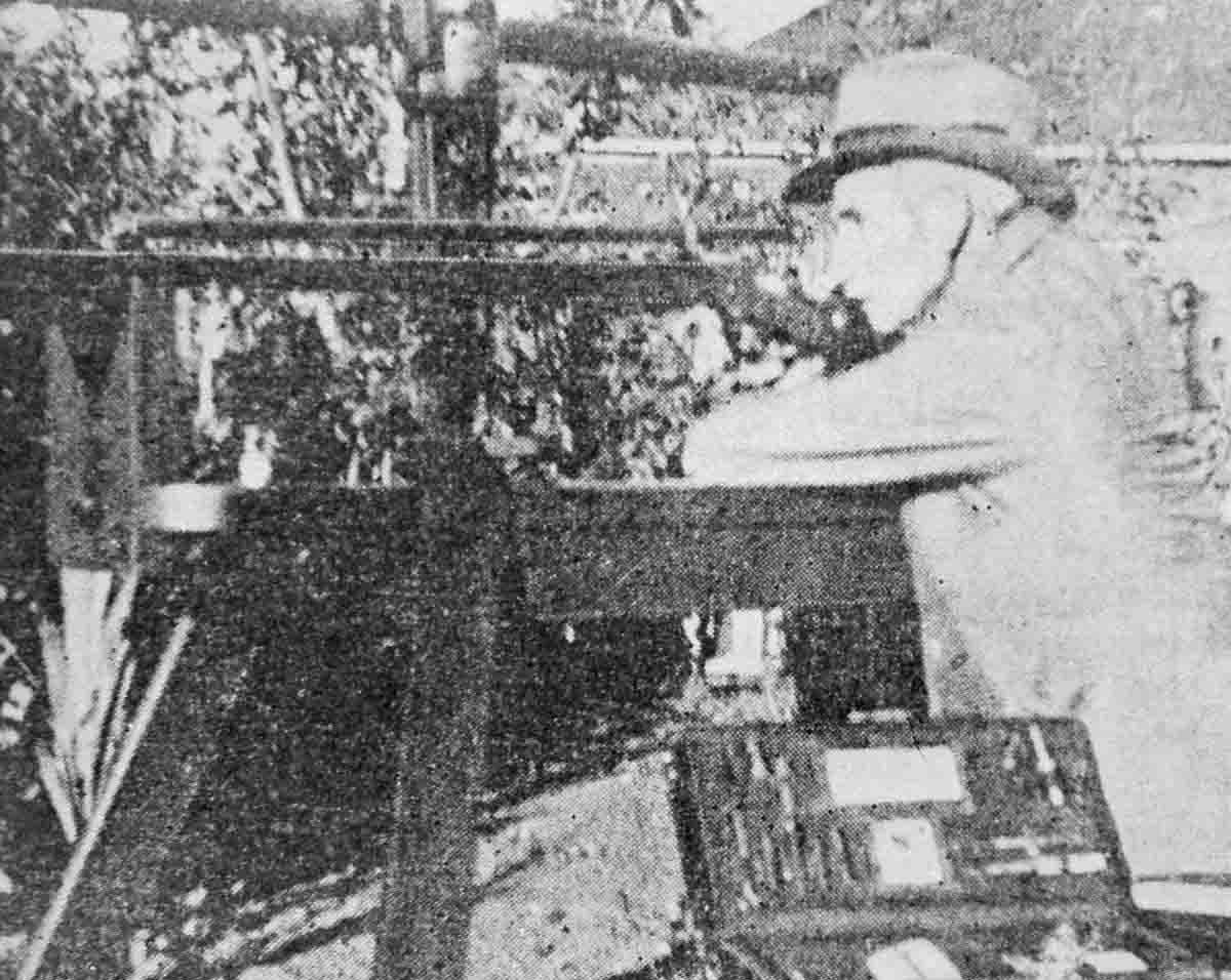 Charles Rowland with his world-record shooting .32-40 Ballard/Pope rifle, reloading kit and portable shooting bench. Original photo taken in 1934 by C.C. Hankins. Photo reproduced from L.R. Wallack, Modern Accuracy